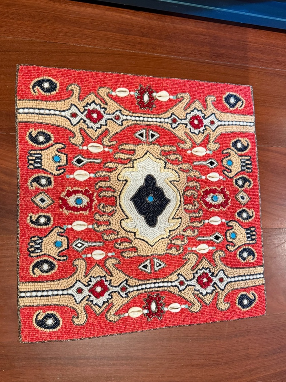 The Nomad Placemats by Kim Seybert is a hand-beaded square bohemian placemat